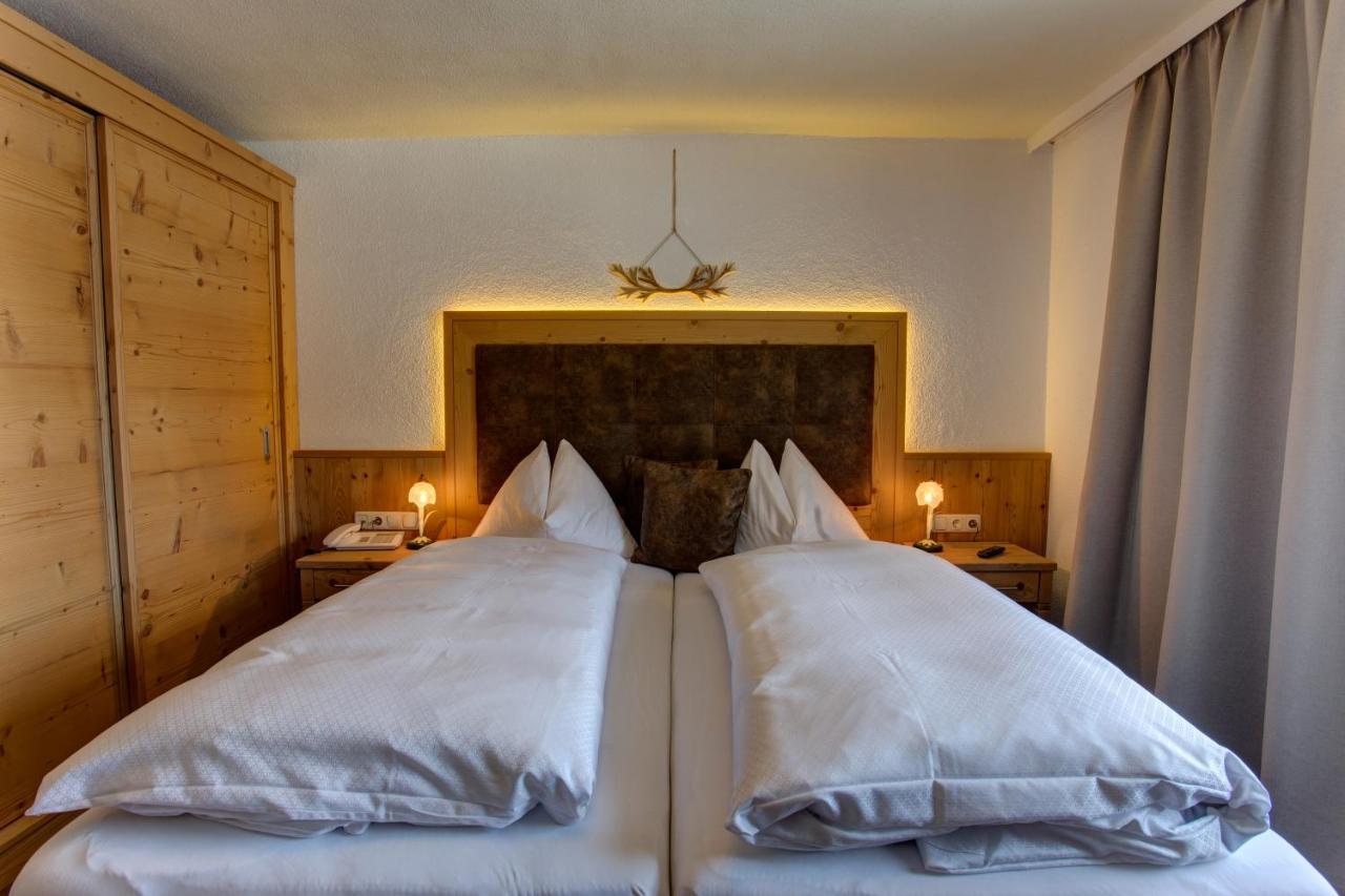 Hotel Garni - Restaurant Kaminstube ซังคท์อันทอนอัมอาร์ลแบร์ก ภายนอก รูปภาพ